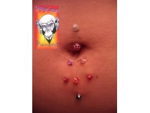 Multi Piercing nombril r&eacute;alisation Derapage Corporel