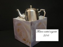 Th&eacute;i&egrave;re en m&eacute;tal argent&eacute;