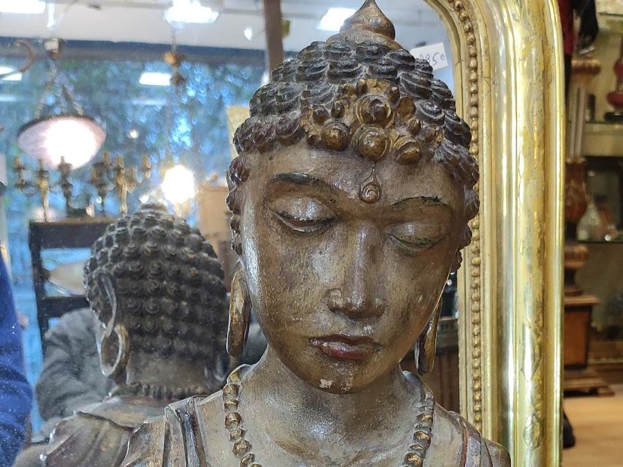Bouddha en bois sculpté